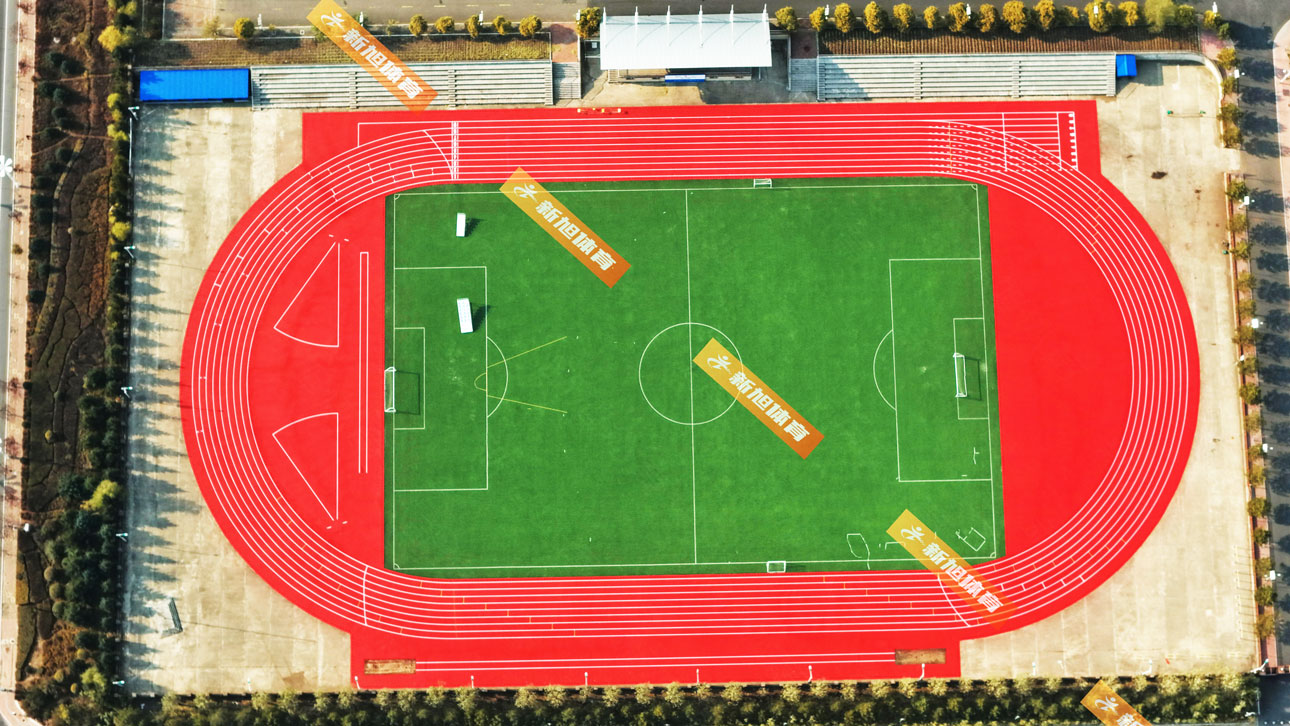 新旭體育哈爾濱混合型自結(jié)紋塑膠跑道完工